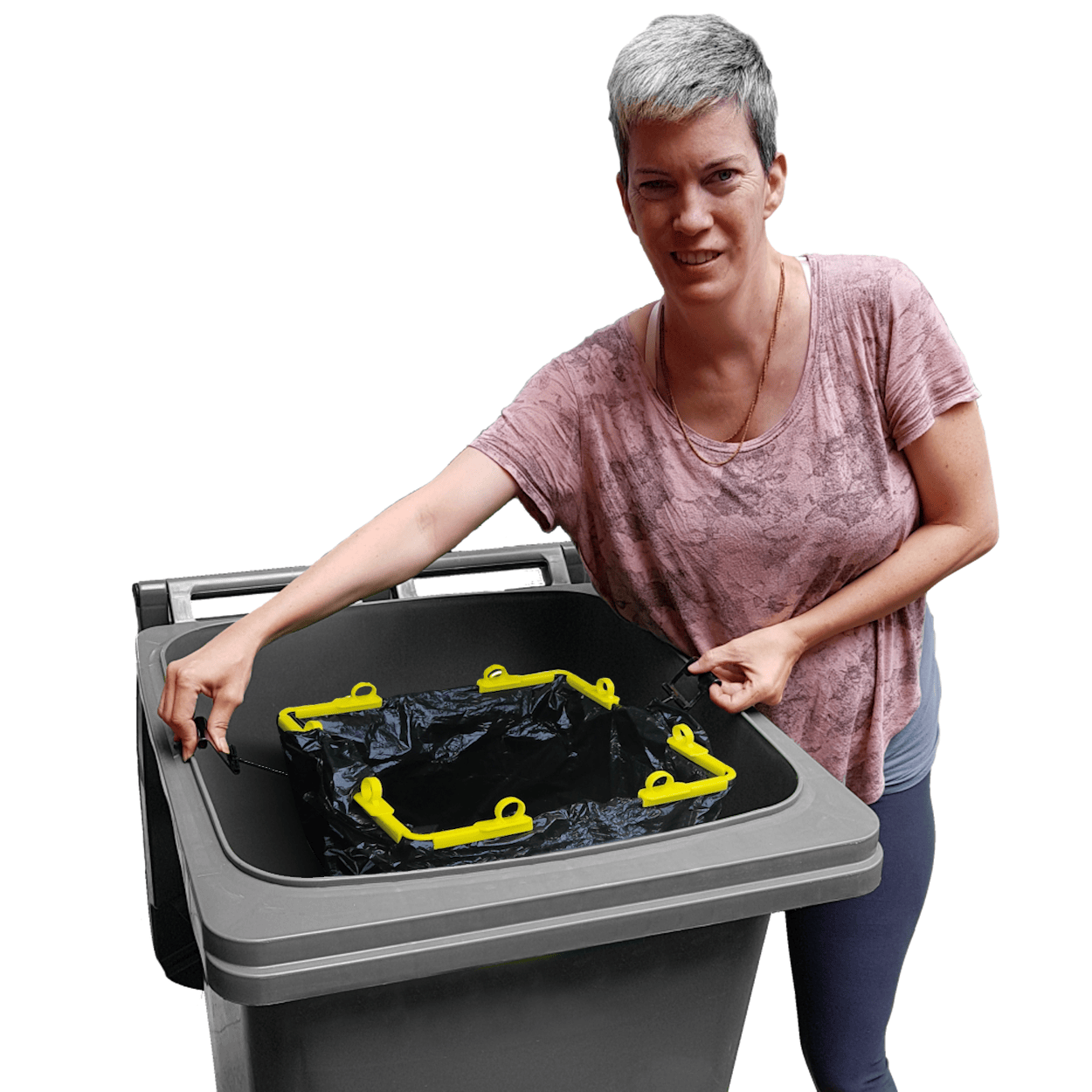 Woman placing a trash can bag holder with yellow bag clips in a bin  on a white background