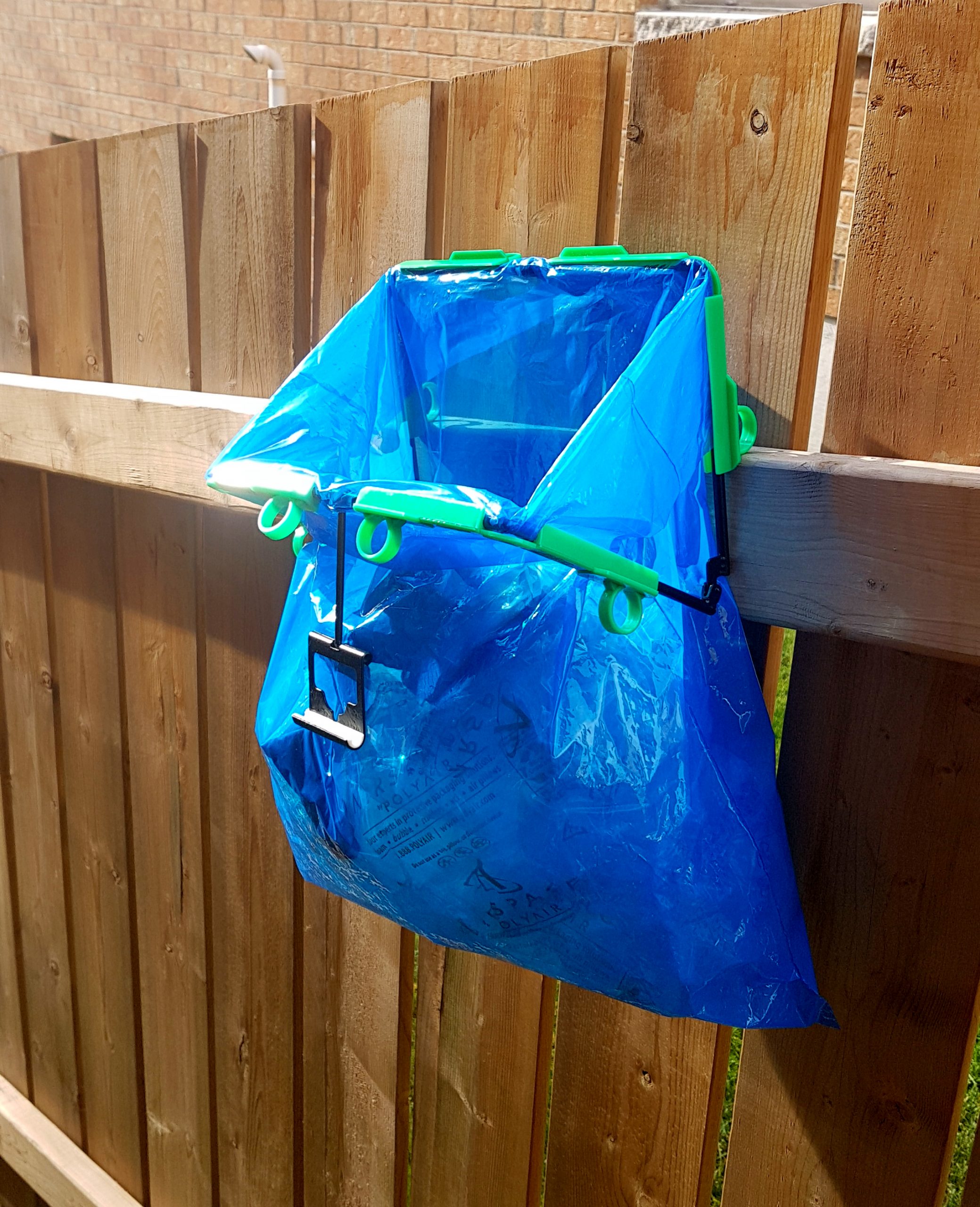 small fence grocery bag blue hanging hands (2)